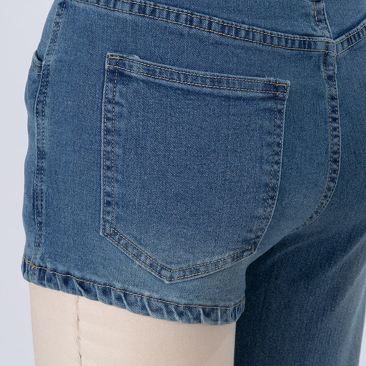 Astra - Trendy asymmetrisk denimshorts med én skulderrem